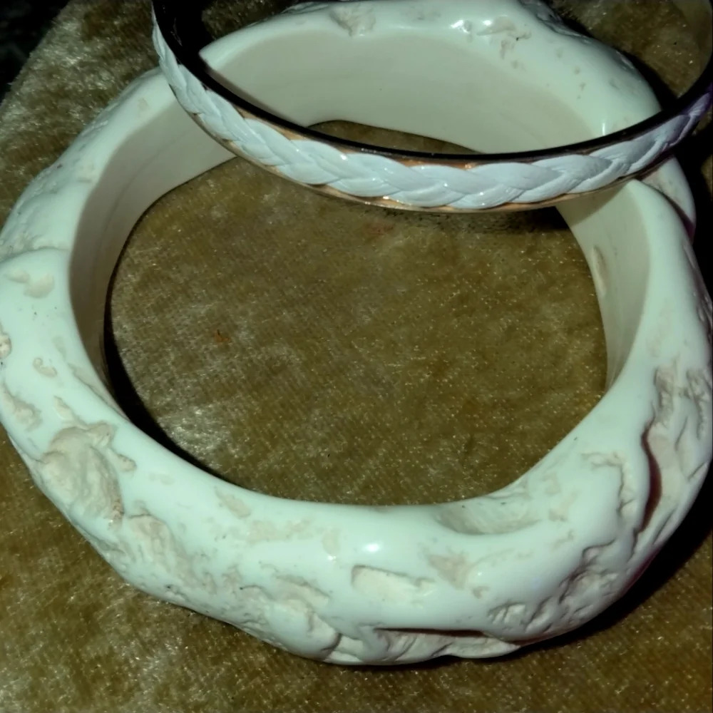 Faux ivory and braided leather on copper bracelets